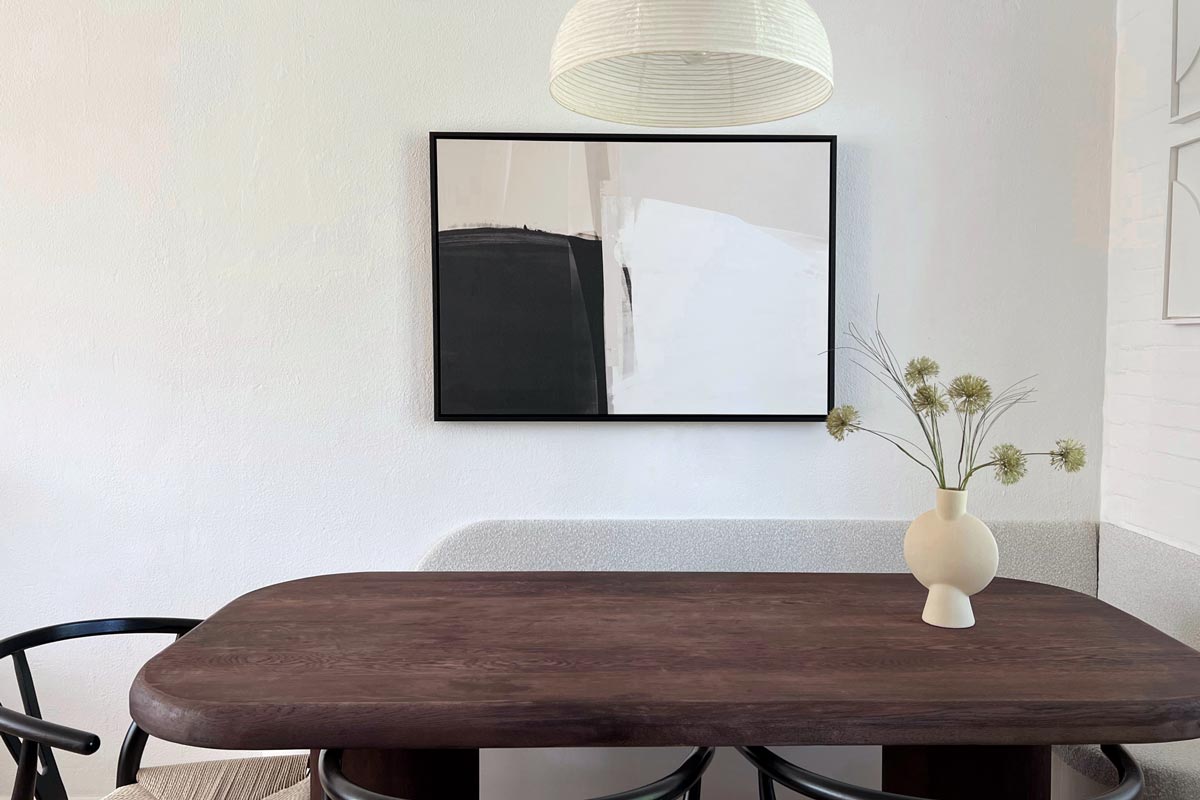 Minimal abstract framed canvas in scandi style dining space
